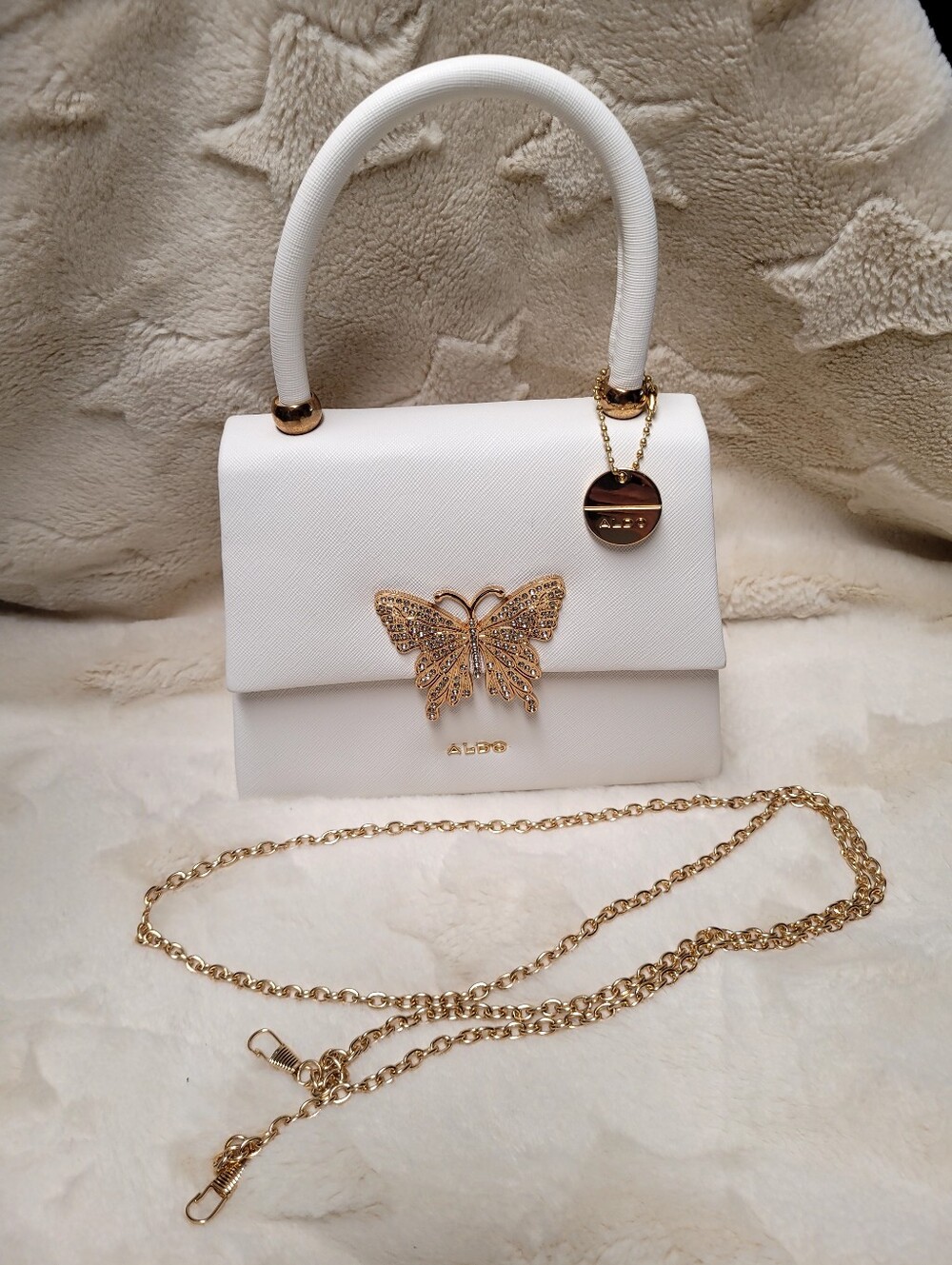 White Aldo Top-Handle Bag with Gold Butterfly Accent